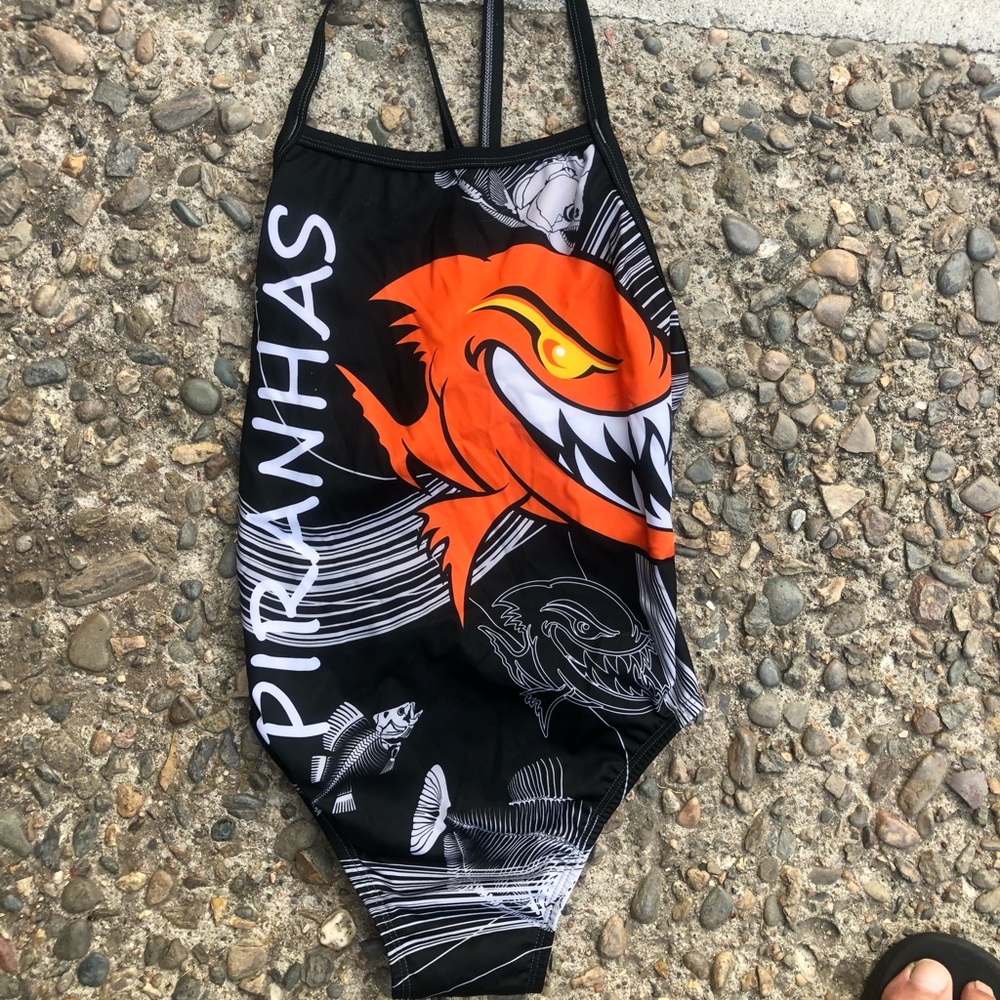 Piranhas one piece swim suit. Size 32.  thin straps